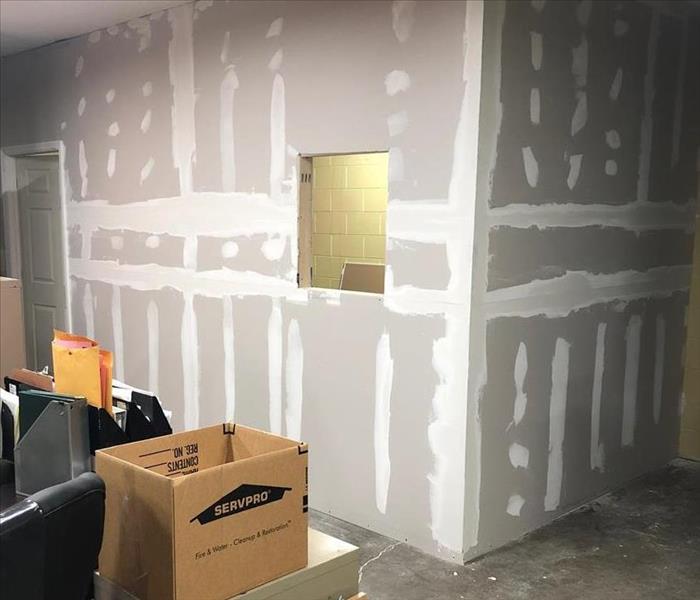 bare sheet rock walls with mud and tape